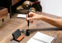 Reasons to Join a Creative Writing Workshop Crop faceless woman dipping pen in inkwell